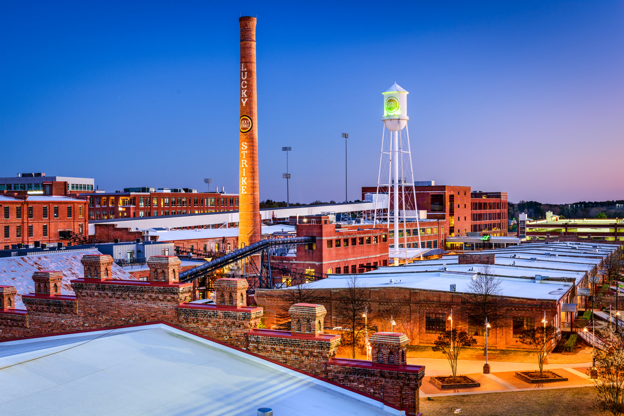 Durham, North Carolina, USA - April 27, 2015: The American Tobacco Historic District. Once the headquarters of the American Tobacco Company, the site is now part of a downtown urban renewal project.