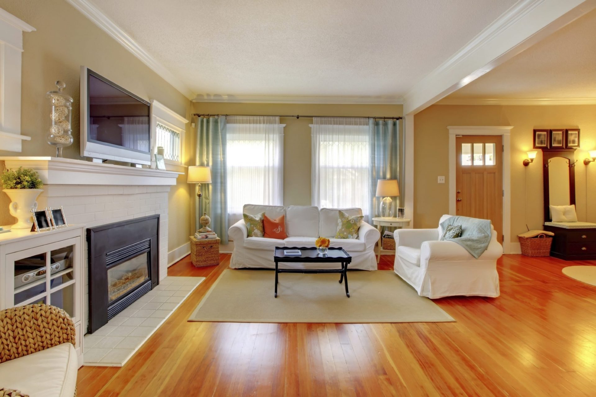 Beautiful white, blue and beige living room. Beautiful living room interior with white sofa, blue and beige.