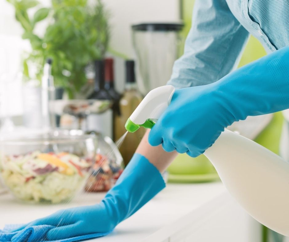 spraying counter House Cleaning